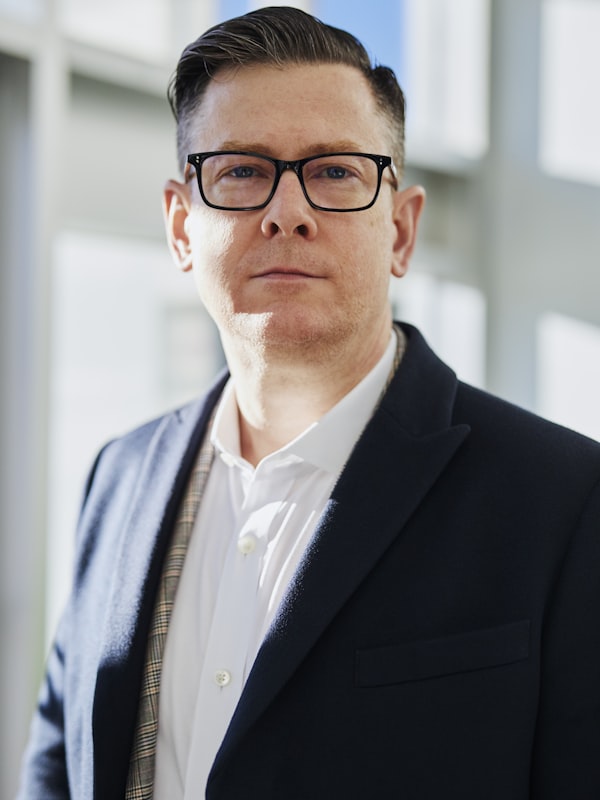 Prof. Tunginba